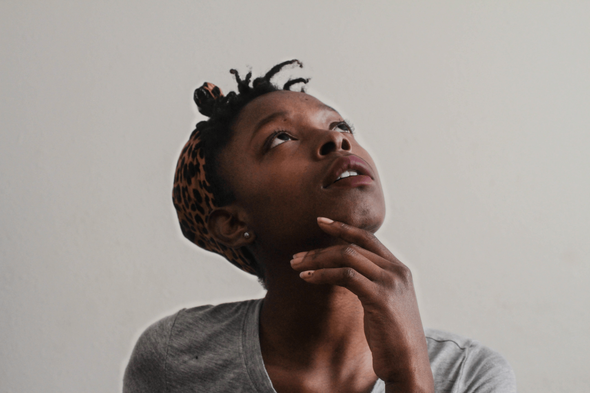 Photo of a woman thinking about window wrapping or spraying